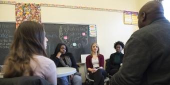 Group speaking in a university room
